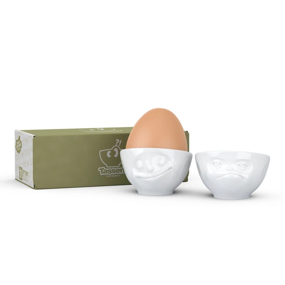 Набір з двох білих глянцевих підставок для яєць "Щаслива усмішка" і "Хмм..." Tassen TASS15301/TI від компанії "Cronos" поза часом - фото 1