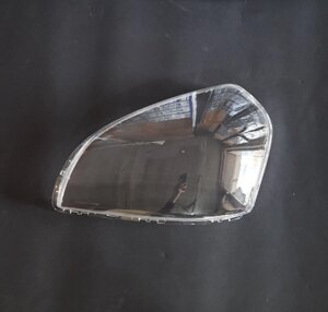 Скло фари Hyundai Tucson 1 JM 2004-2010 ліве