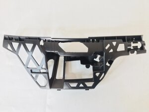 Кріплення переднього бампера праве под фарою VW Passat 2012-2015 565D807724