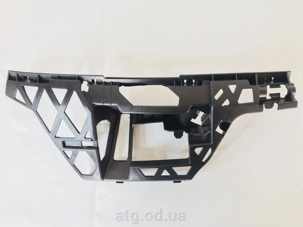 Кріплення переднього бампера праве под фарою VW Passat 2012-2015 565D807724 від компанії ATG-Parts - запчастини кузова та оптика - фото 1