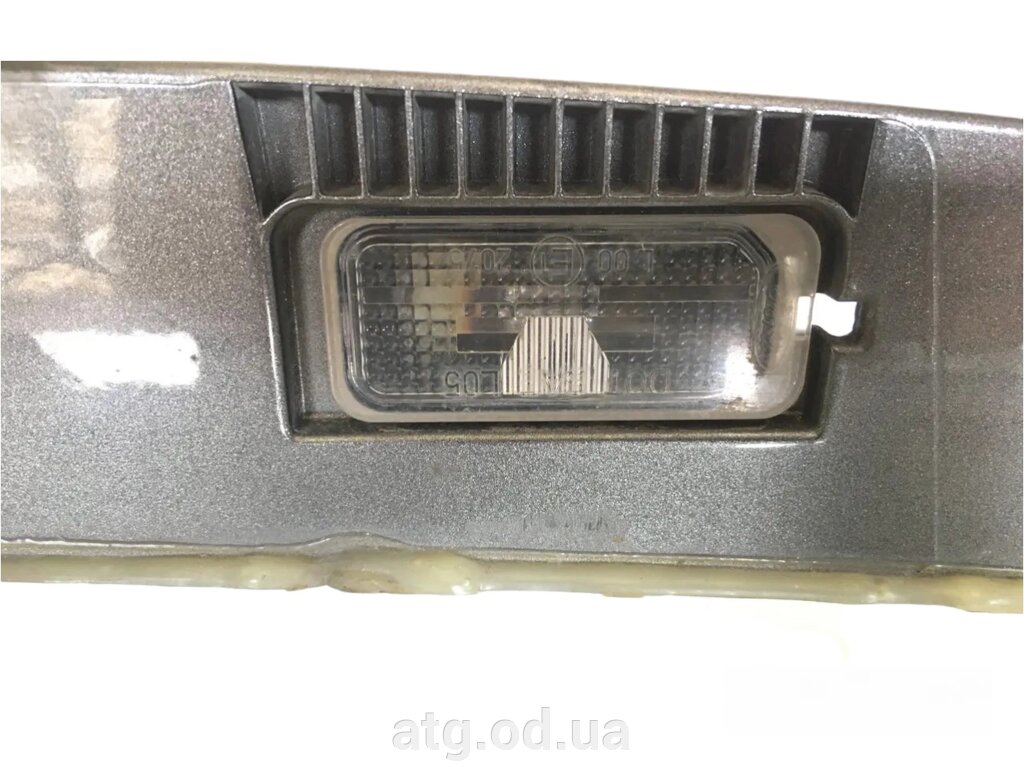 Підсвітка номера права Ford C-Max Hybrid 13-18 оригінал  6M2Z13550A від компанії ATG-Parts - запчастини кузова та оптика - фото 1