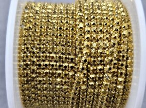 Стразовий ланцюжок, колір золотий металік в золотом металі ss6 (2 mm) 1м.