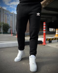 Зимові спортивні штани Adidas з начісом чорні теплі / штани Адідас на зиму на флісі чорного кольору