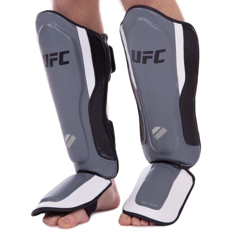 Захист гомілки й стопи для єдиноборств UFC PRO Training UHK-69981 S-M сріблястий, чорний від компанії Спортивний інтернет - магазин "One Sport" - фото 1