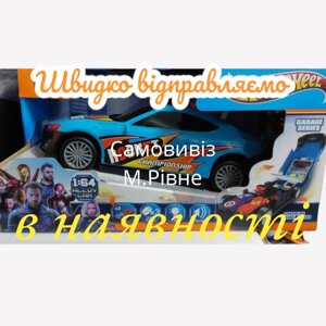 Перегоновий автомобіль гараж Hot Wheels 8645 хот вилс музика світо