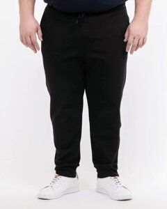 Спортивні штани чоловічі на флісі великкого розміру. Оптом. Модель на манжеті.
