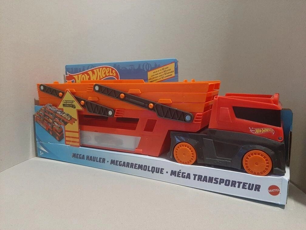 Автотрейлер автовоз Hot Wheels Mattel Mega Hauler для 50 машинок. США від компанії K V I T K A - фото 1