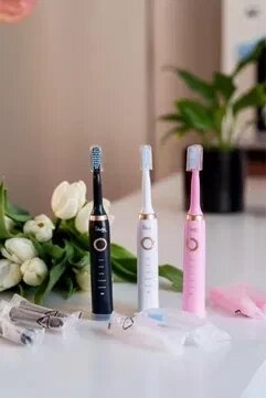 Електрична зубна щітка Shuke з 4-ма насадками 5 режимів від компанії K V I T K A - фото 1