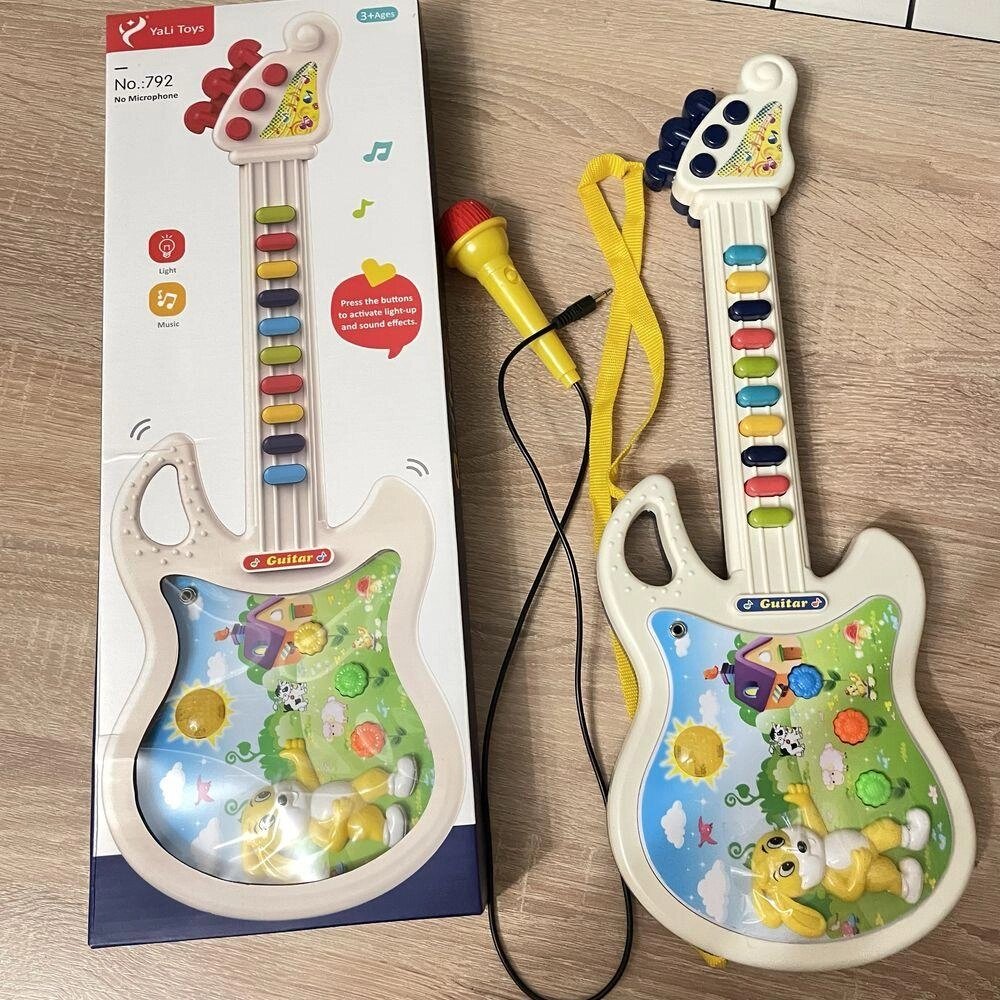 Іграшка музична гітара з мікрофоном 45 см від компанії K V I T K A - фото 1