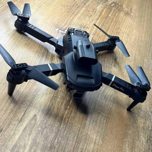 Quadcopter E100 Drone із 4K обходяться перешкодами. 20 хв. Корпус+ батареї