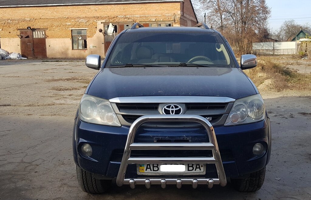 Кенгурятник високий з двома перемичками і грилем для Toyota Fortuner 2005-2011 від компанії AUTOAS - фото 1