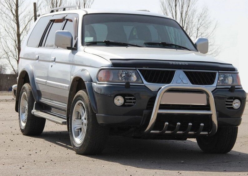 Кенгурятник з перемичкою і грилем QT006 (нерж) для Mitsubishi Pajero Sport 1996-2007. від компанії AUTOAS - фото 1