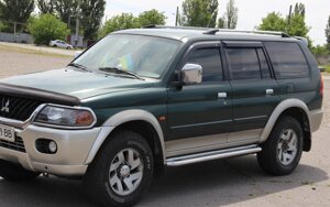 Бічний захист пороги майданчик Mitsubishi Pajero Sport 1996-2008 Кенгурятник дуги пороги