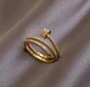 Кільце перстень цвях Cartier шикарне з камінням. Медзолото.
