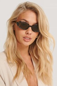 Жіночі окуляри брендові в стилі 90-х. Тренд сезона.