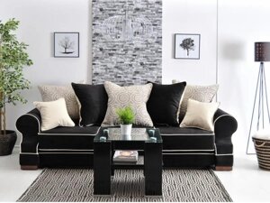 Чорний диван із подушками струму