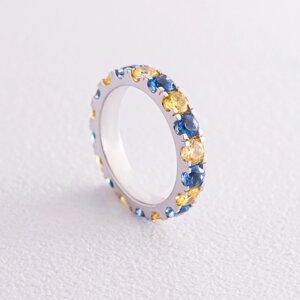 Кільце з доріжкою синього та жовтого каменів (біле золото) K07108