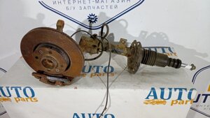 Амортизатор передній лівий в зборі Nissan Micra K12 2003-2010