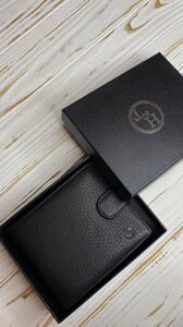 Чоловічий шкіряний гаманець HT Чорного кольору 308
