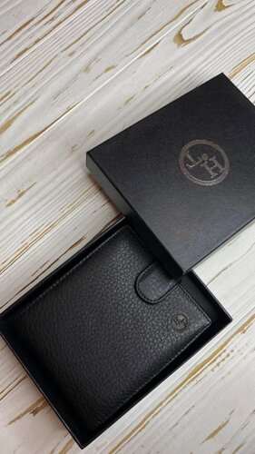 Чоловічий шкіряний гаманець HT Чорного кольору 308