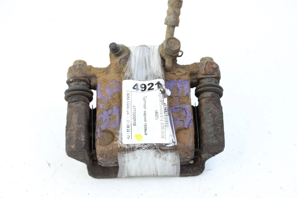 Caliper задній правий Toyota Corolla E12 2000-2006 4773002110 (4921) від компанії Автозапчастини б/в для японських автомобілів - вибирайте Razborka6062 - фото 1