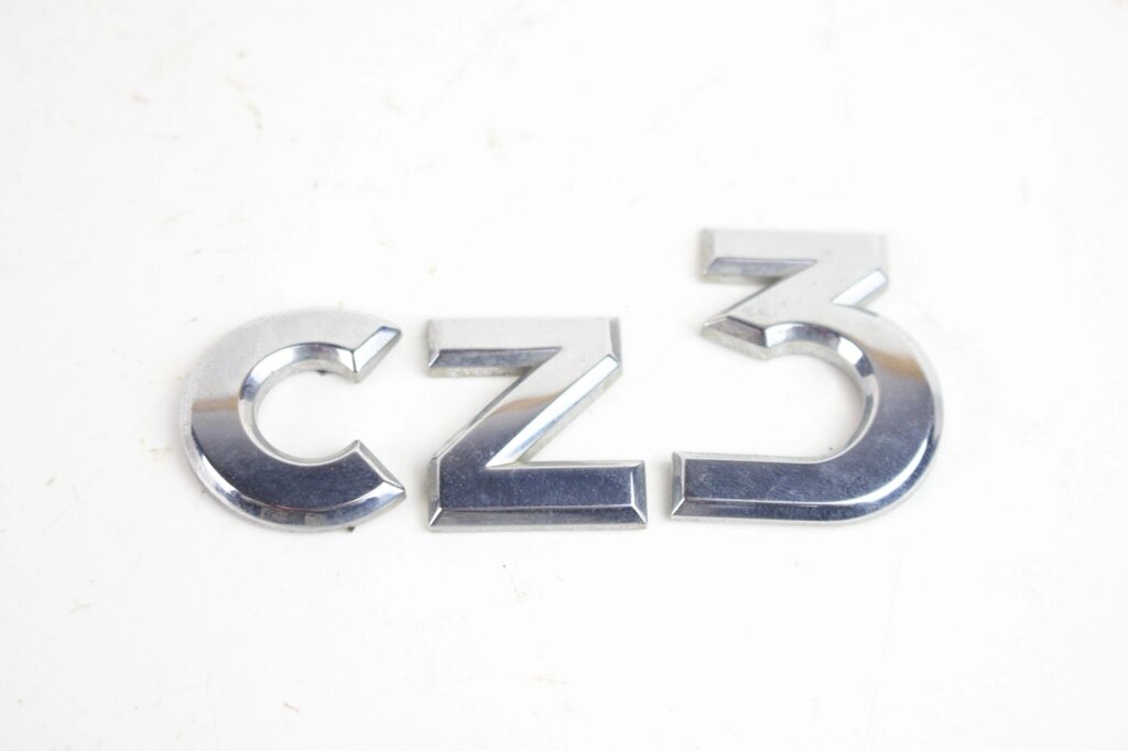 Емблема кришки багажника (cz3) Mitsubishi Colt (Z30) 2004-2012 MN127038 (76623) від компанії Автозапчастини б/в для японських автомобілів - вибирайте Razborka6062 - фото 1