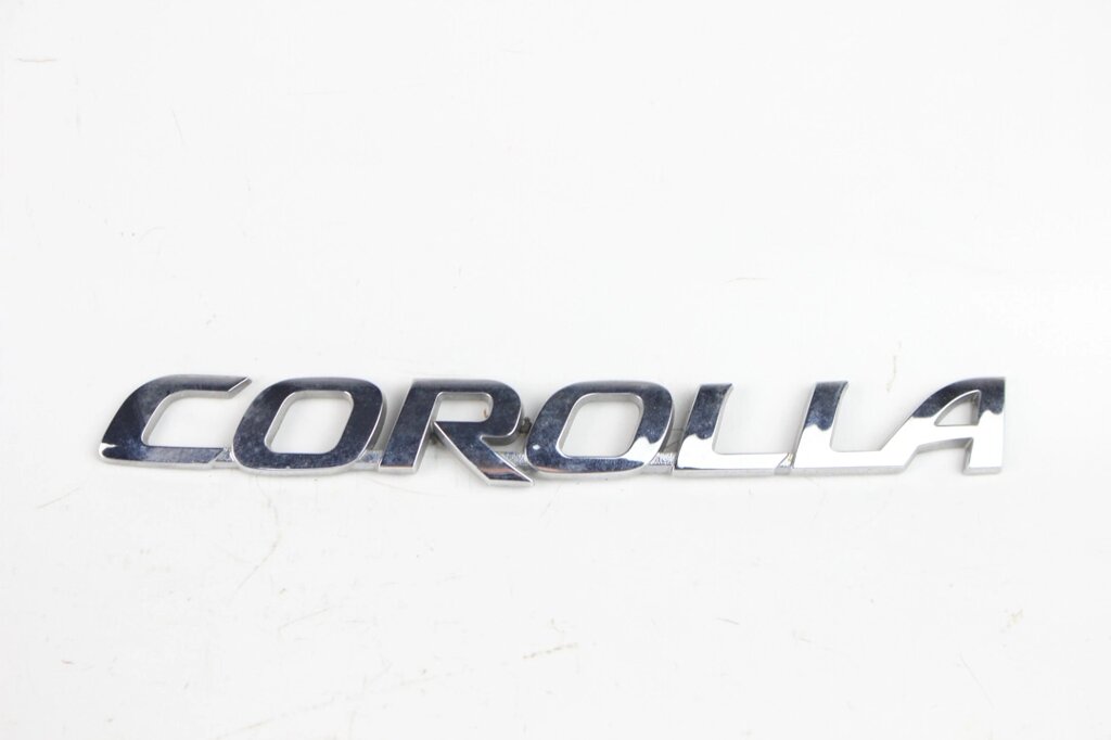 Емблема кришки багажника Toyota Corolla E21 2019-2021 7544202480 (76062) від компанії Автозапчастини б/в для японських автомобілів - вибирайте Razborka6062 - фото 1