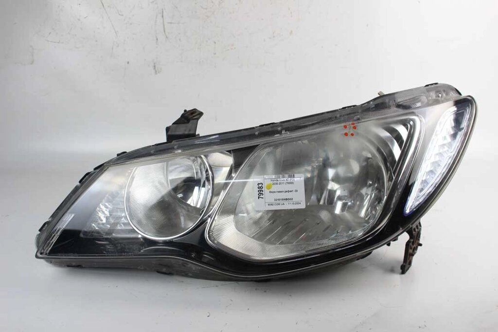 Фара ліва дефект -09 Honda Civic 4D (FD) 2006-2011 33151SNBG02 (79983) від компанії Автозапчастини б/в для японських автомобілів - вибирайте Razborka6062 - фото 1