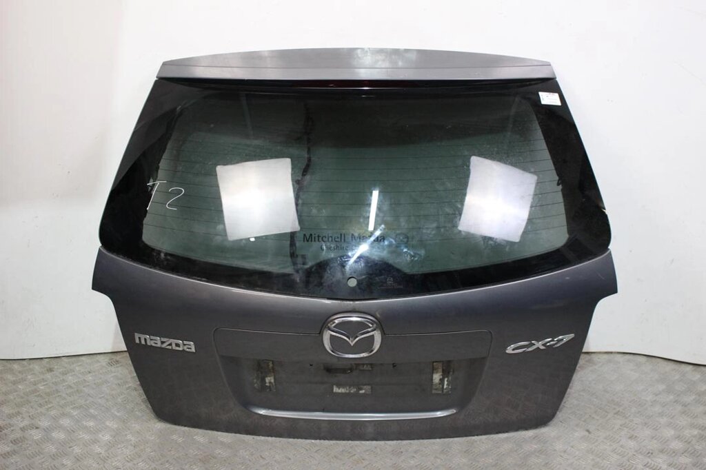 Кришка багажника Mazda CX-7 2006-2012 EGY16202XB (16175) черня дефект (6062) та чорна в обухові від компанії Автозапчастини б/в для японських автомобілів - вибирайте Razborka6062 - фото 1