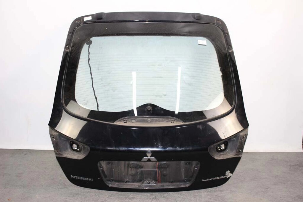 Кришка багажника sportback гола Mitsubishi Lancer X 2007-2013 5801A731 (27895) без скла чорна від компанії Автозапчастини б/в для японських автомобілів - вибирайте Razborka6062 - фото 1
