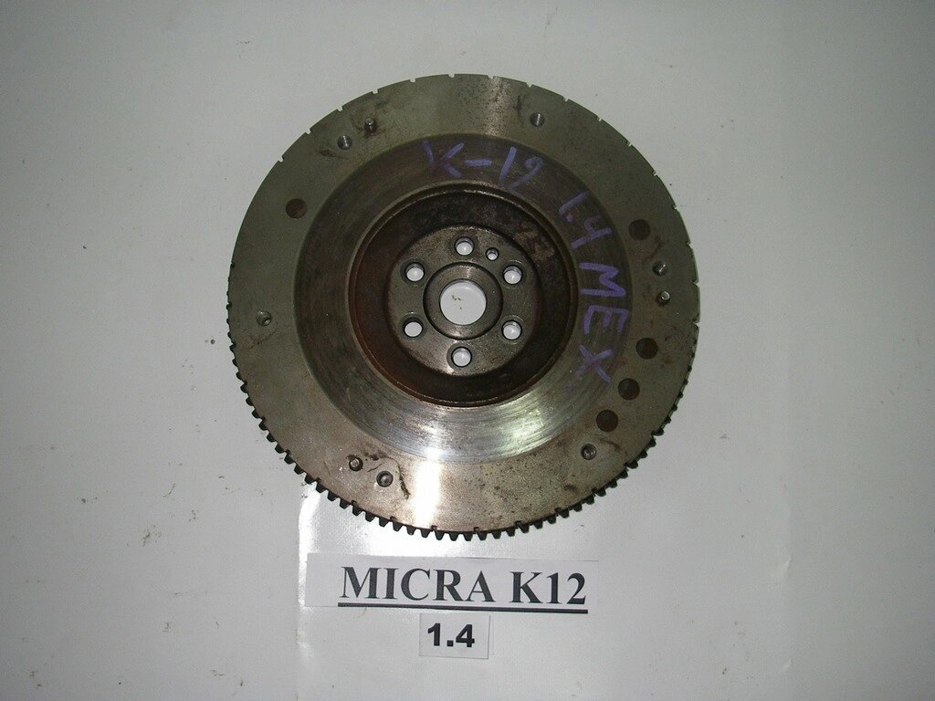 Маховик МКПП 1.4 Nissan Micra (K12) 2002-2011 12311BX010 (1 193) від компанії Автозапчастини б/в для японських автомобілів - вибирайте Razborka6062 - фото 1