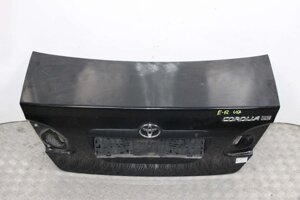 Кришка багажника USA седан Toyota Corolla E12 2000-2006 644011E020 (32071) в Києві от компании Автозапчасти б/у для японских автомобилей – выбирайте Razborka6062