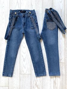 Сині джинси на дівчинку 6-9 років.
