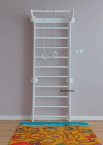 Біла шведська стінка із буку з кільцями