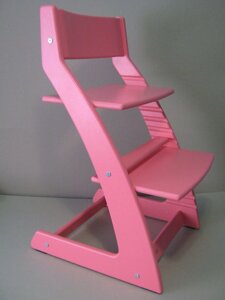 Дитячий стільчик зростаючий з підставкою для ніг в рожевому кольорі