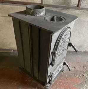 Буржуазної печі Чавуннайя (52 кг, 12 мм) під казаном, плита під казаном