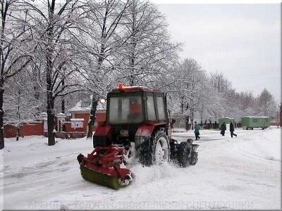 Трактор навантажувач для прибирання снігу Київ - фото