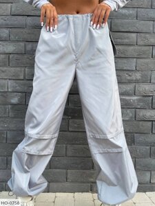Стильні широкі штани карго жіночі повсякденні молодіжні прогулянкові з плащівки з накладними кишенями 46/48