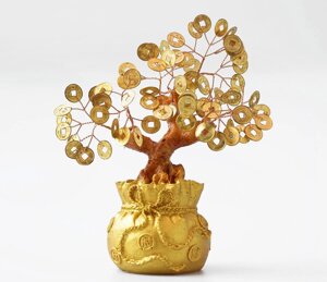 Деревина з золотими монетами в мішку