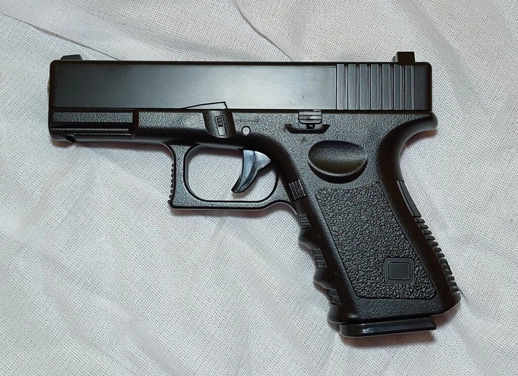 Дитячий іграшковий пістолет металевий G. 15 ( репліка glock 17) від компанії Кратус - фото 1