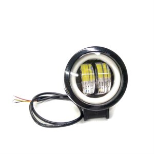 Дополнительная LED фара с четкой светотеневой границей и желтым габаритом, круглая черная