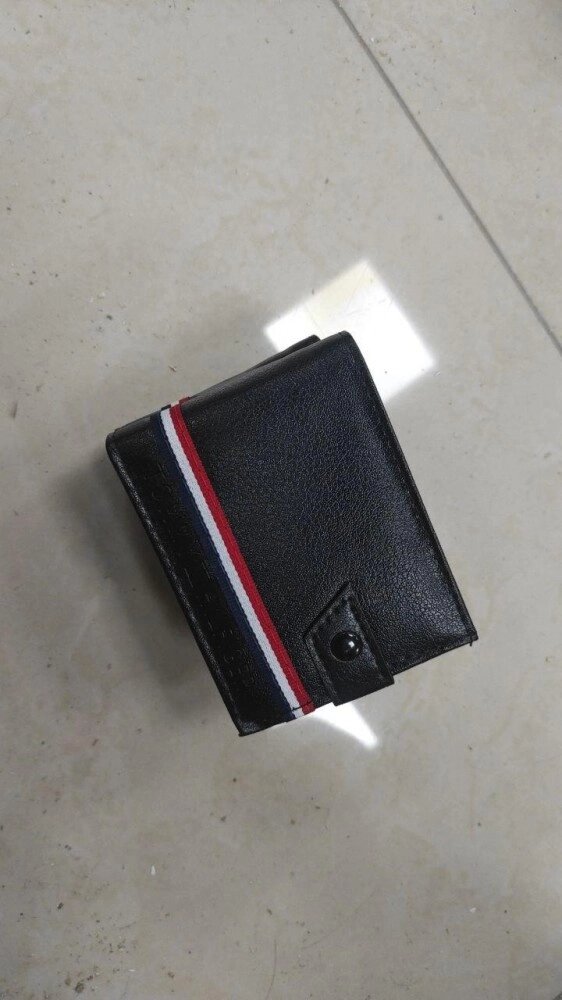 Гаманець шкіряний Tommy Hilfiger /чорний var2 від компанії Elektromax - фото 1