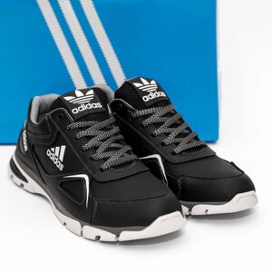 Шкіряні кросівки Adidas чорні.