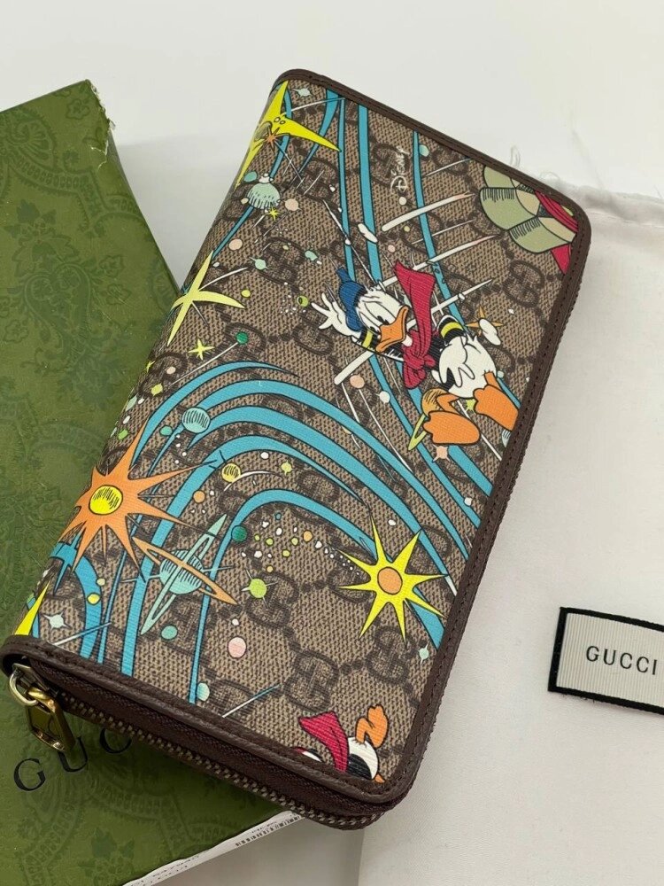 Вертикальний гаманець Gucci Aria з принтом Disney від компанії Elektromax - фото 1