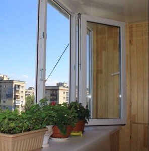 Скління балкона профілем Rehau в Києві от компании «Okna-Shop» интернет магазин