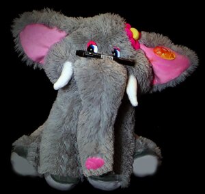 М'яка дитяча іграшка слон 45 см сидить сірий з квіткою на голові співає іграшка