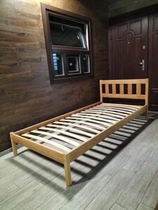 Ліжко односпальне з дерев'яним наголов'ям із масиву вільхи Барбара RoomerIN, колір темний горіх, горіх