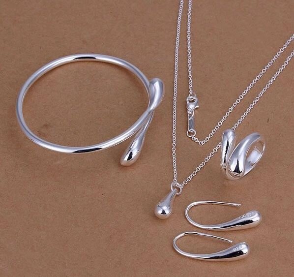 Комплект прикрас жіночий ланцюжок з кулоном, сережки, каблучка і браслет, покриті сріблом код 824 від компанії Shock km ua - фото 1