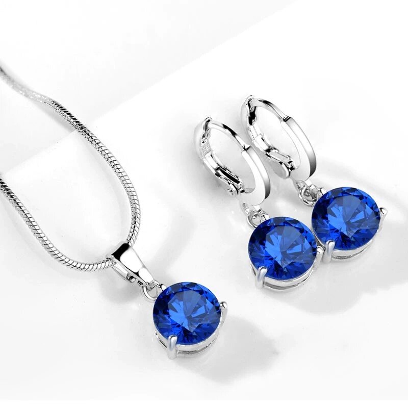 Комплект прикрас жіночий сережки, ланцюжок і кулон з синім камінням код 1015 від компанії Shock km ua - фото 1