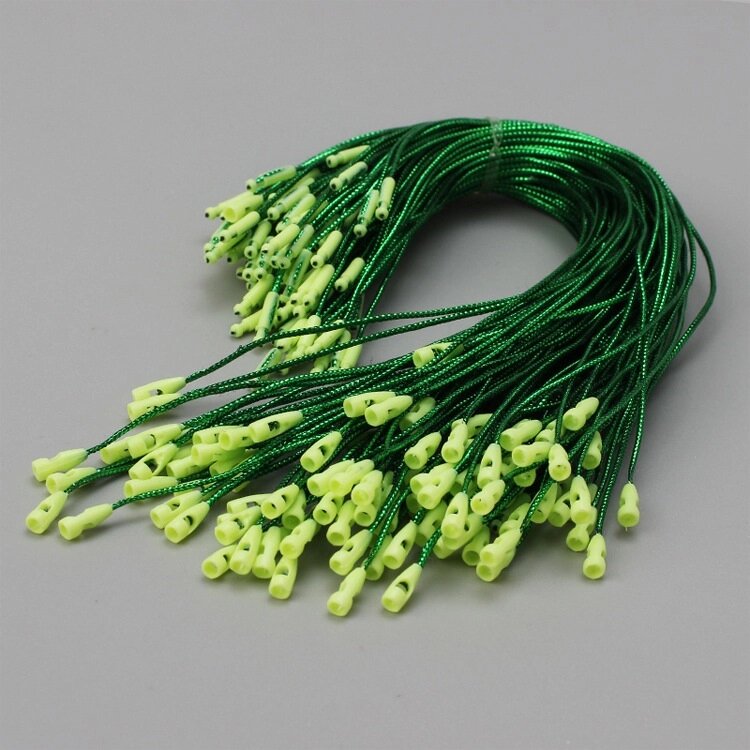 Мотузка для новорічних іграшок на ялинку 14027 100 шт/уп 20 см зелена від компанії Shock km ua - фото 1